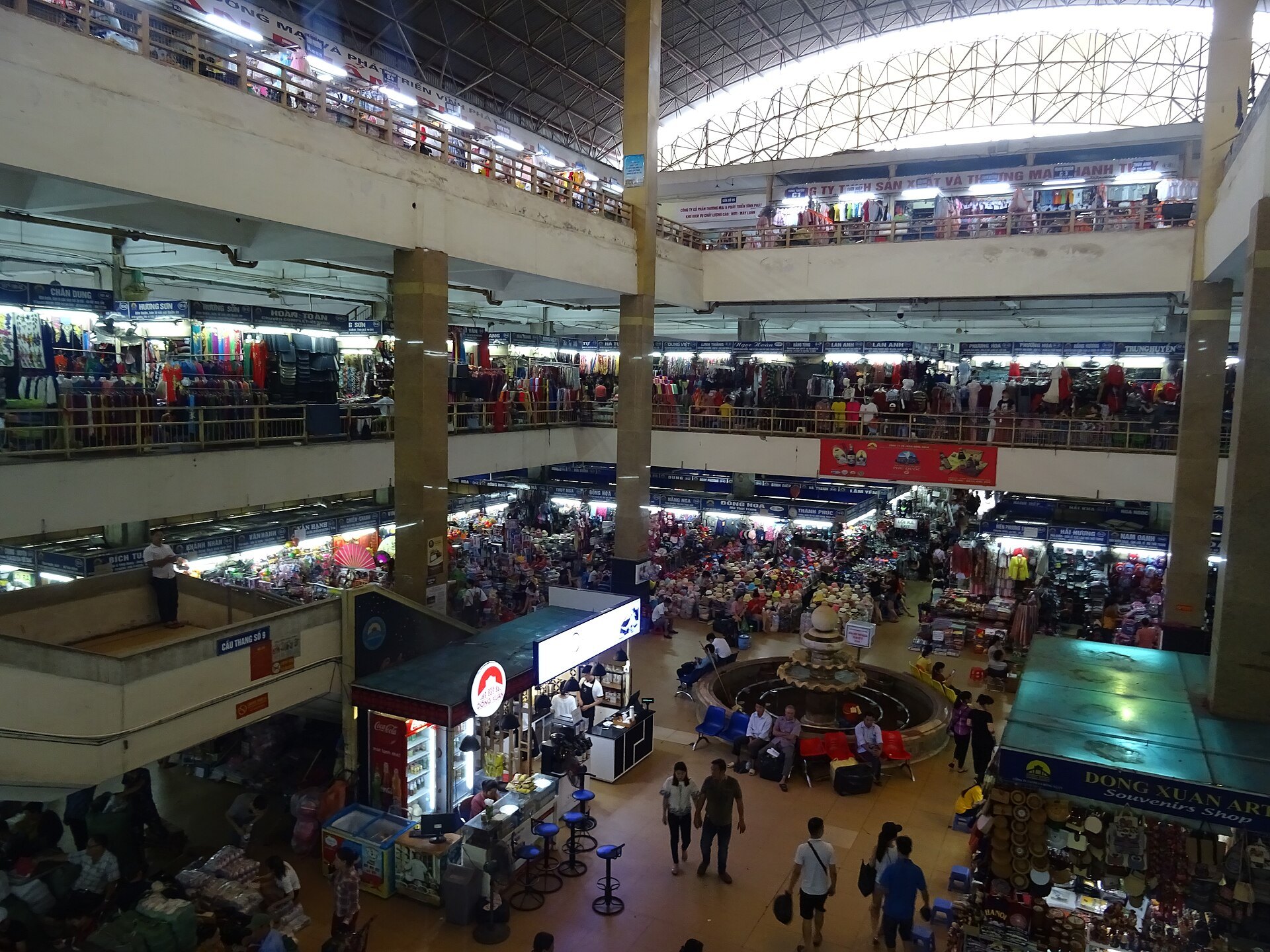 The upper galleries inside Dong Xuan Market, stalls on every level