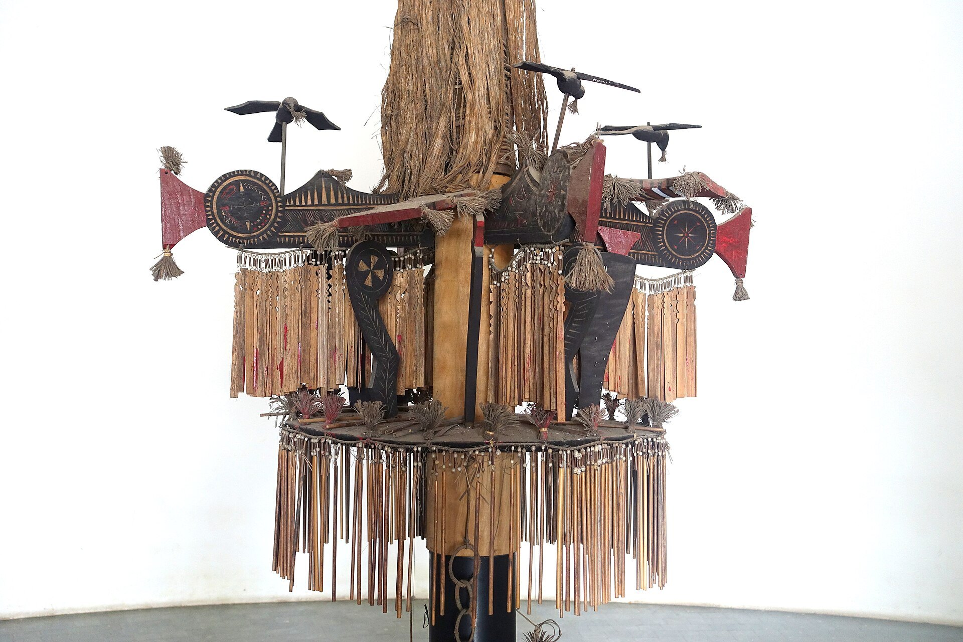A carved ritual pole from the Co people displayed in the museum