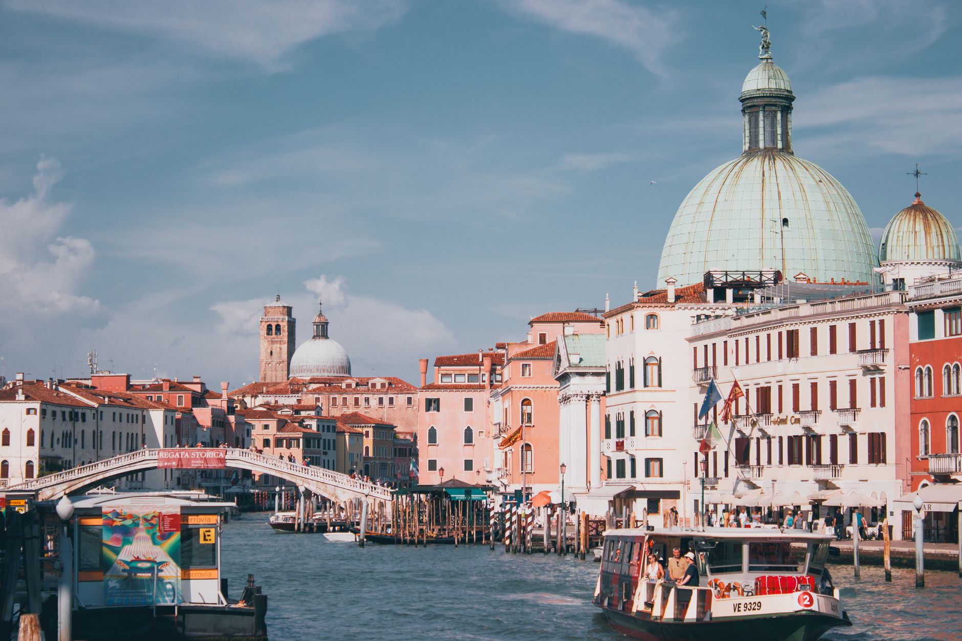 Explore the architecture and waterways of Venice with domes overlooking the Grand Canal