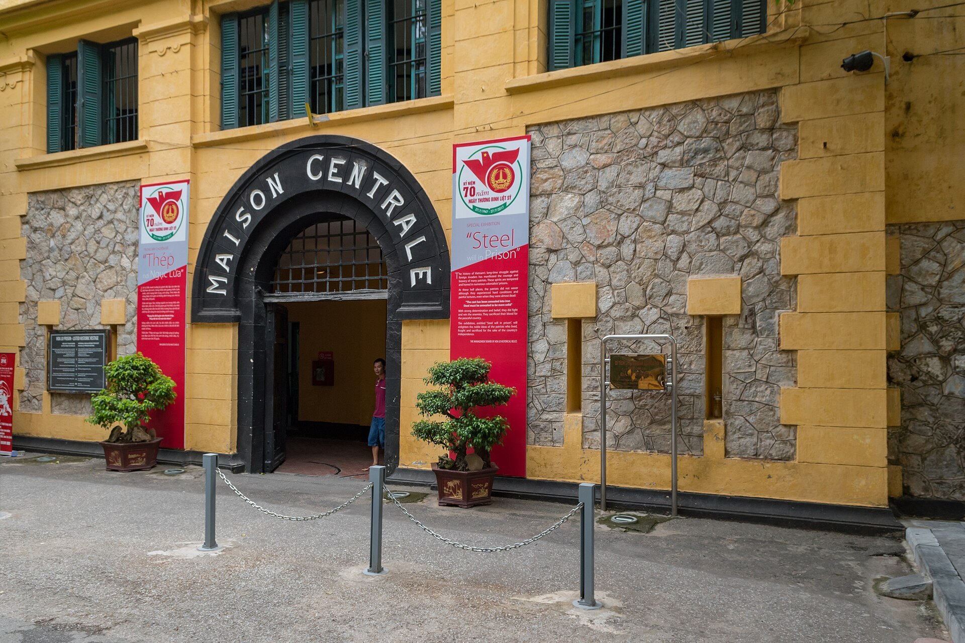 The Maison Centrale entrance with museum banners either side