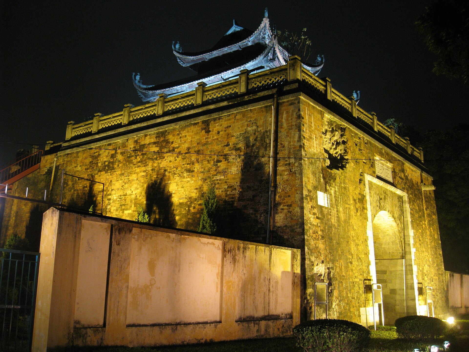 The citadel's north gate lit against the night sky