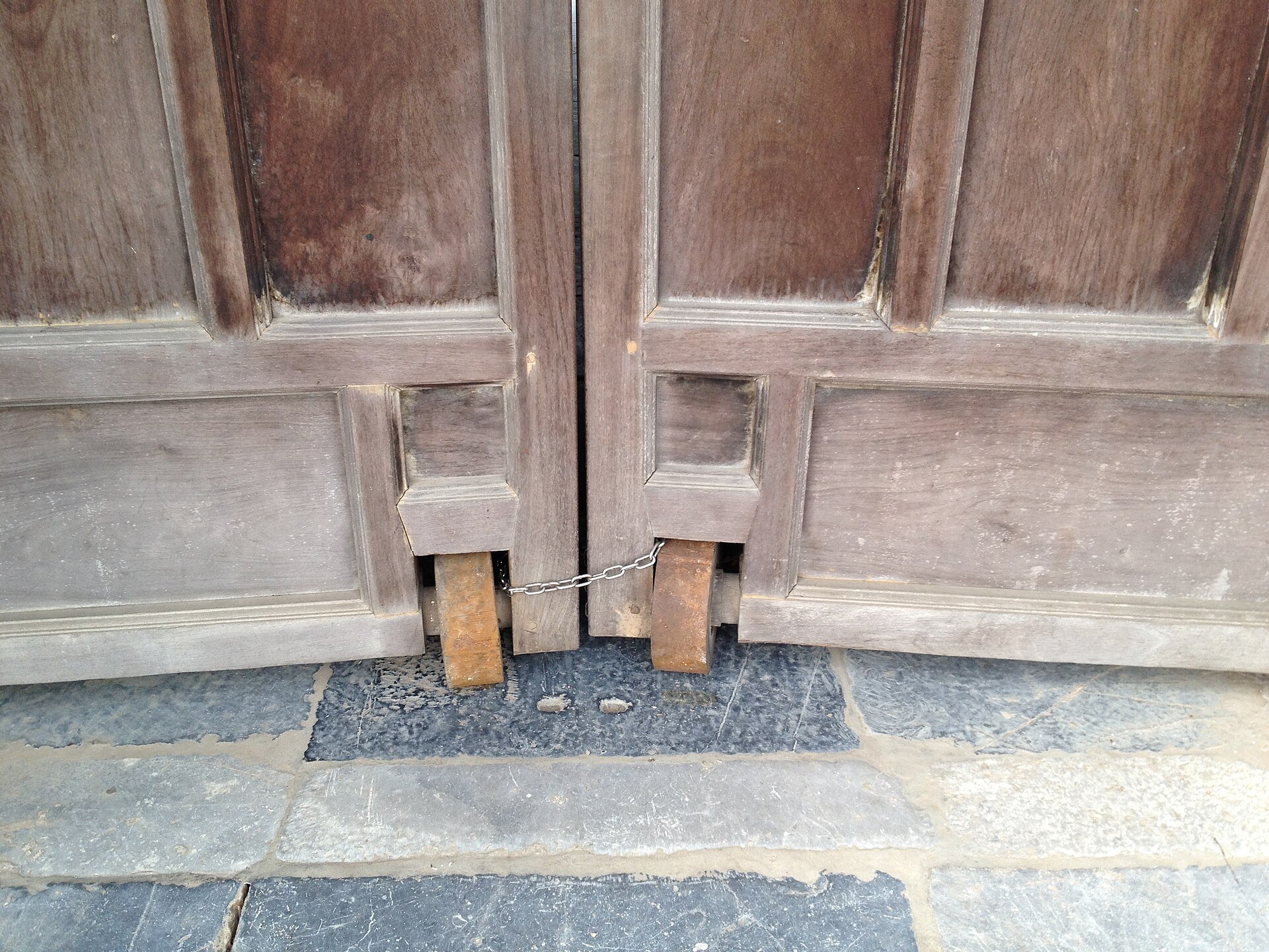 The heavy timber doors of the citadel gate with their iron studs