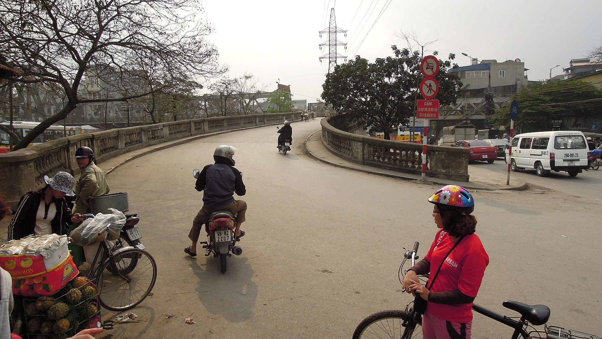 Motorbikes on the ramp up onto the bridge