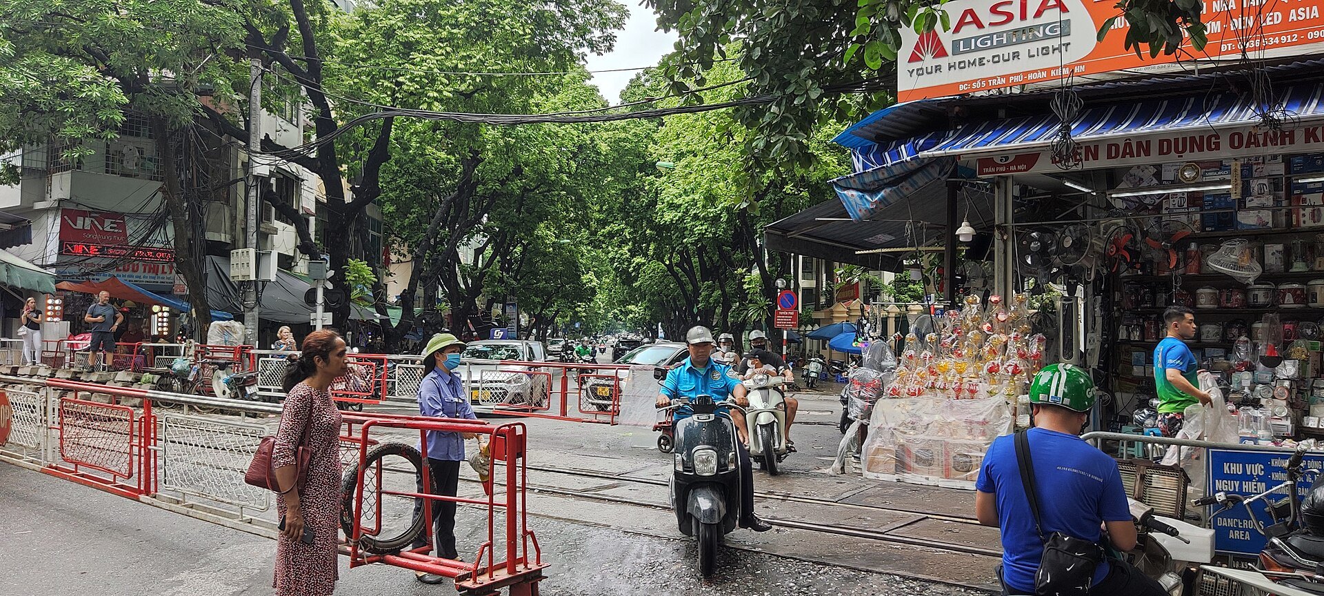 The barriered street beside the track after the cafés were cleared