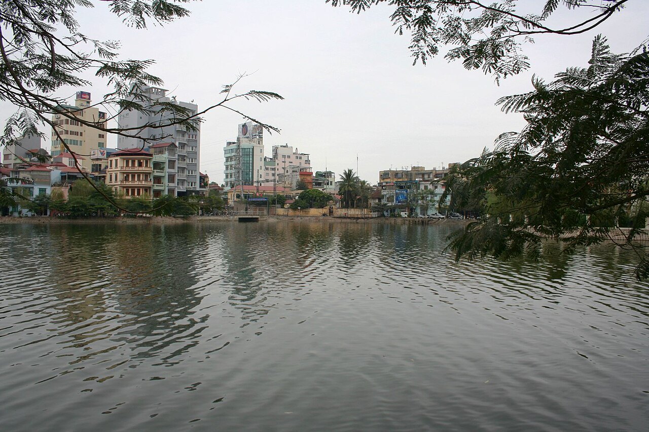 Truc Bach lake with the buildings of the district along the far shore